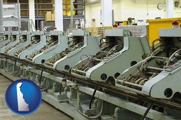 bindery machines in a bookbinding factory - with Delaware icon