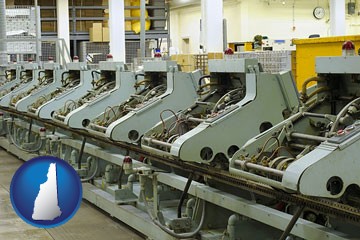 bindery machines in a bookbinding factory - with New Hampshire icon