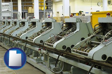 bindery machines in a bookbinding factory - with Utah icon
